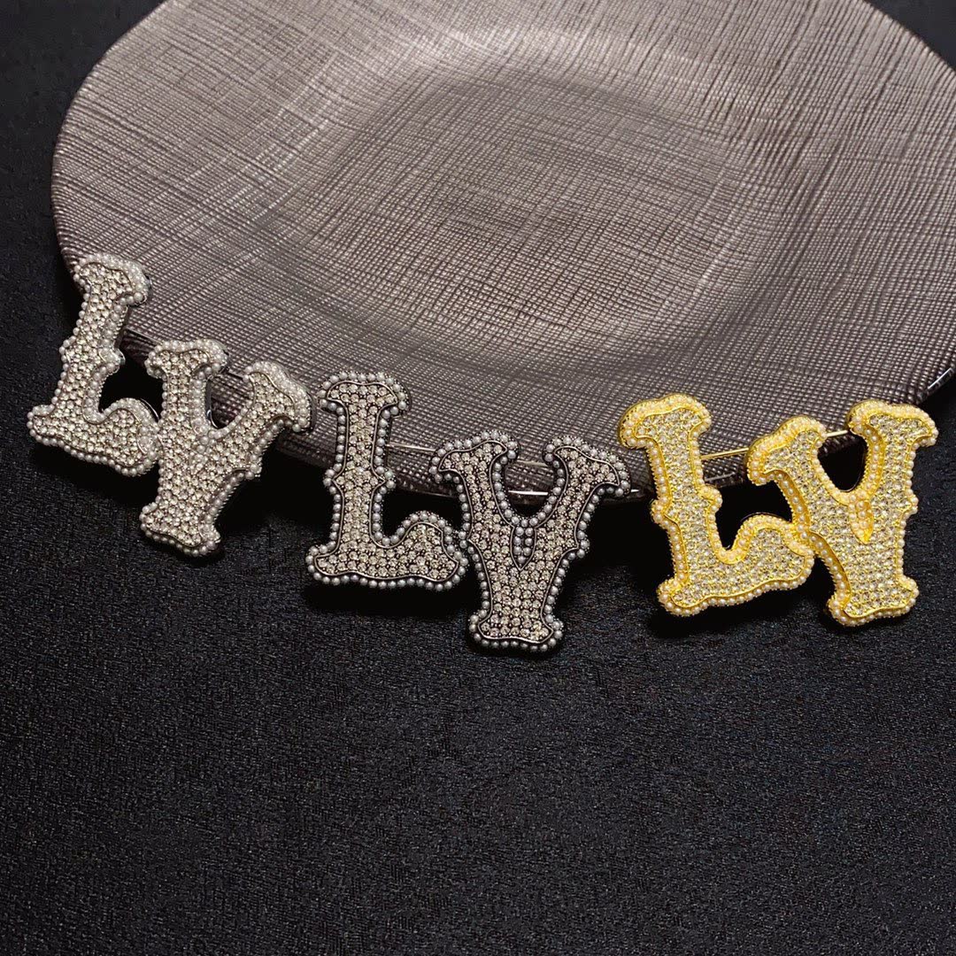 Louis Vuitton Crystal Embellished 'LV' Brooch